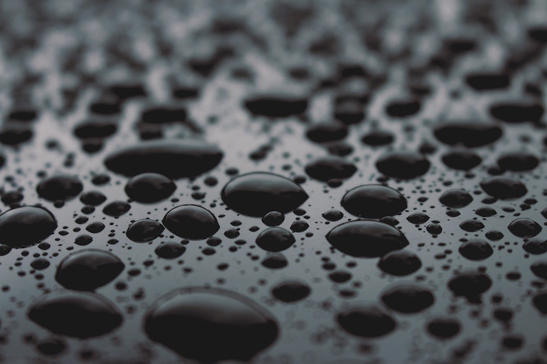 Metal with water droplets