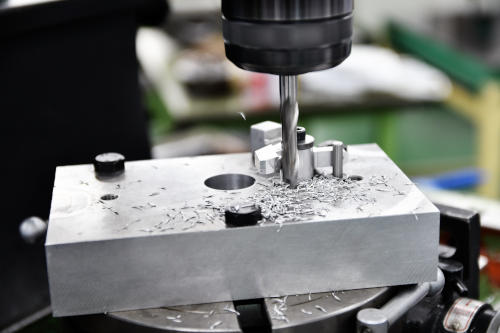 Drilling aluminum piece
