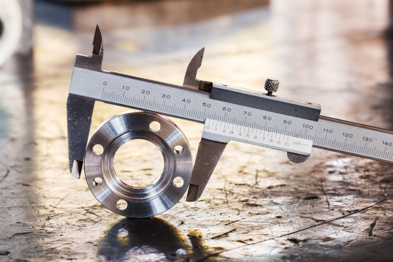 Caliper measuring stainless steel flange