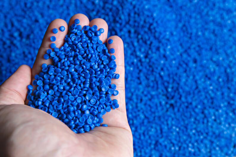 Plastic resin in hand