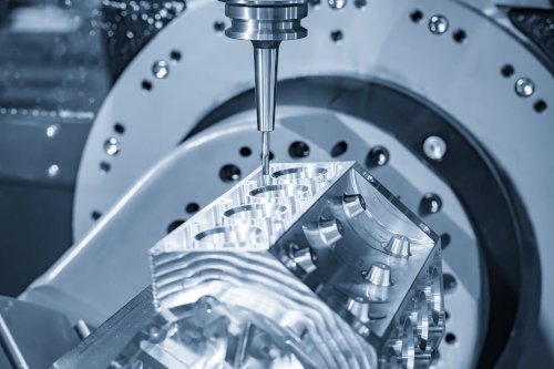 Engine block being CNC machined for the automotive industry