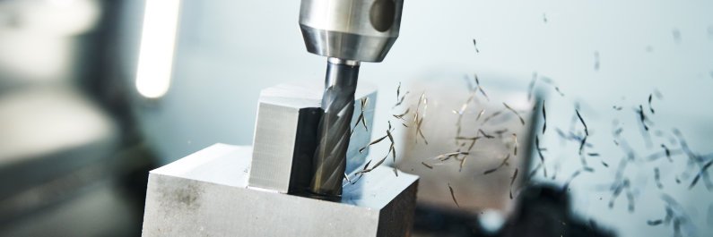 CNC milling machine performing subtractive manufacturing after CNC Cad design