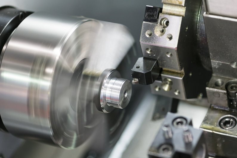 CNC turning threaded metal automotive part