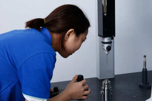 Gensun QC staff usign cmm
