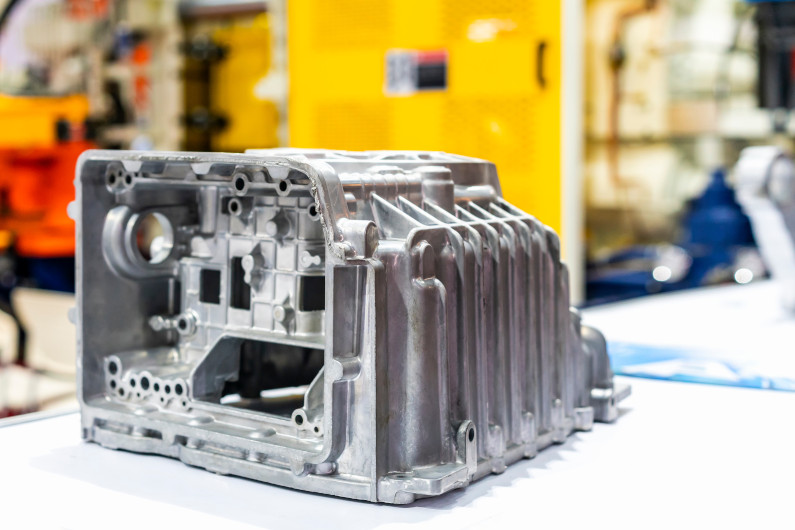 Cast automotive part before machining