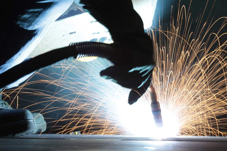 welder working on sheet metal